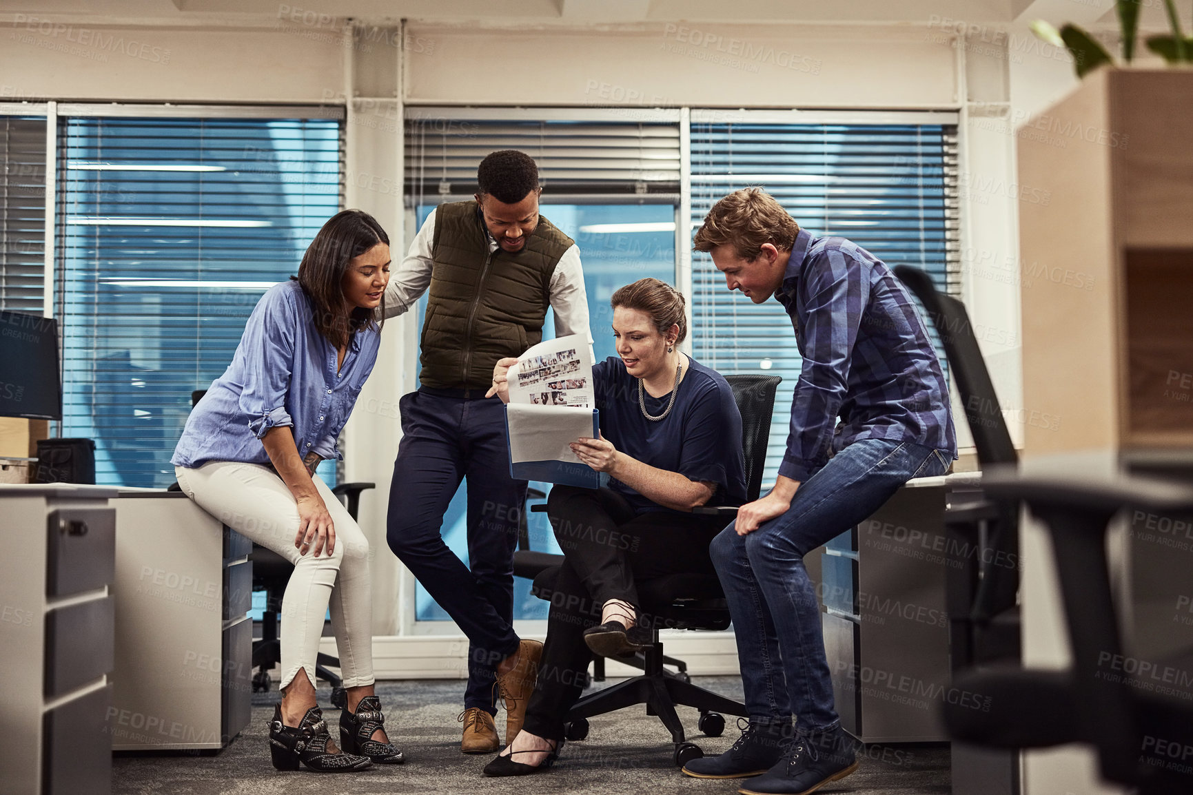Buy stock photo Shot of a group of designers brainstorming together in an office