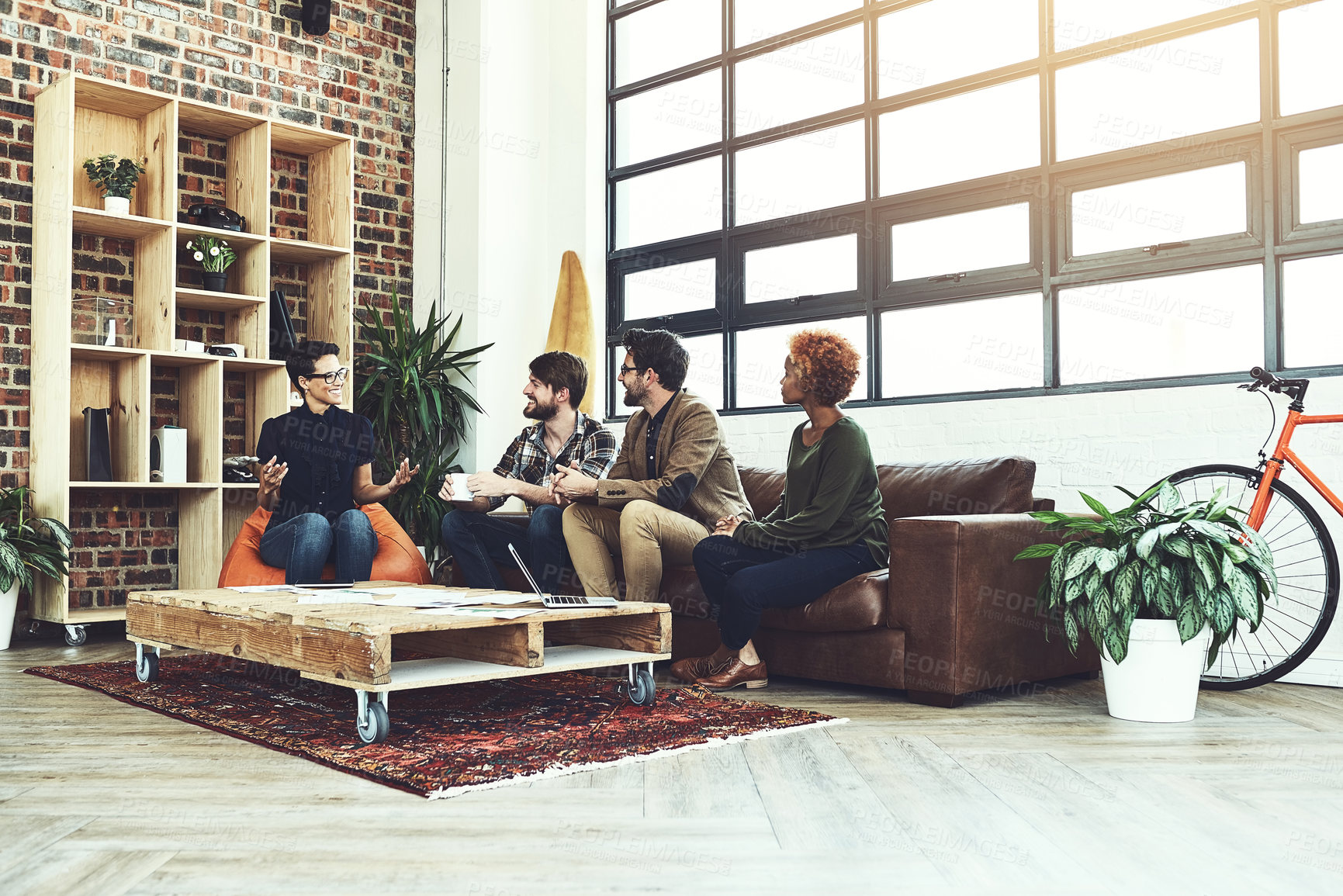 Buy stock photo Office, teamwork and business people on couch for discussion, planning and feedback for startup progress. Creative agency, employees and collaboration in meeting, listening and cooperation for goal