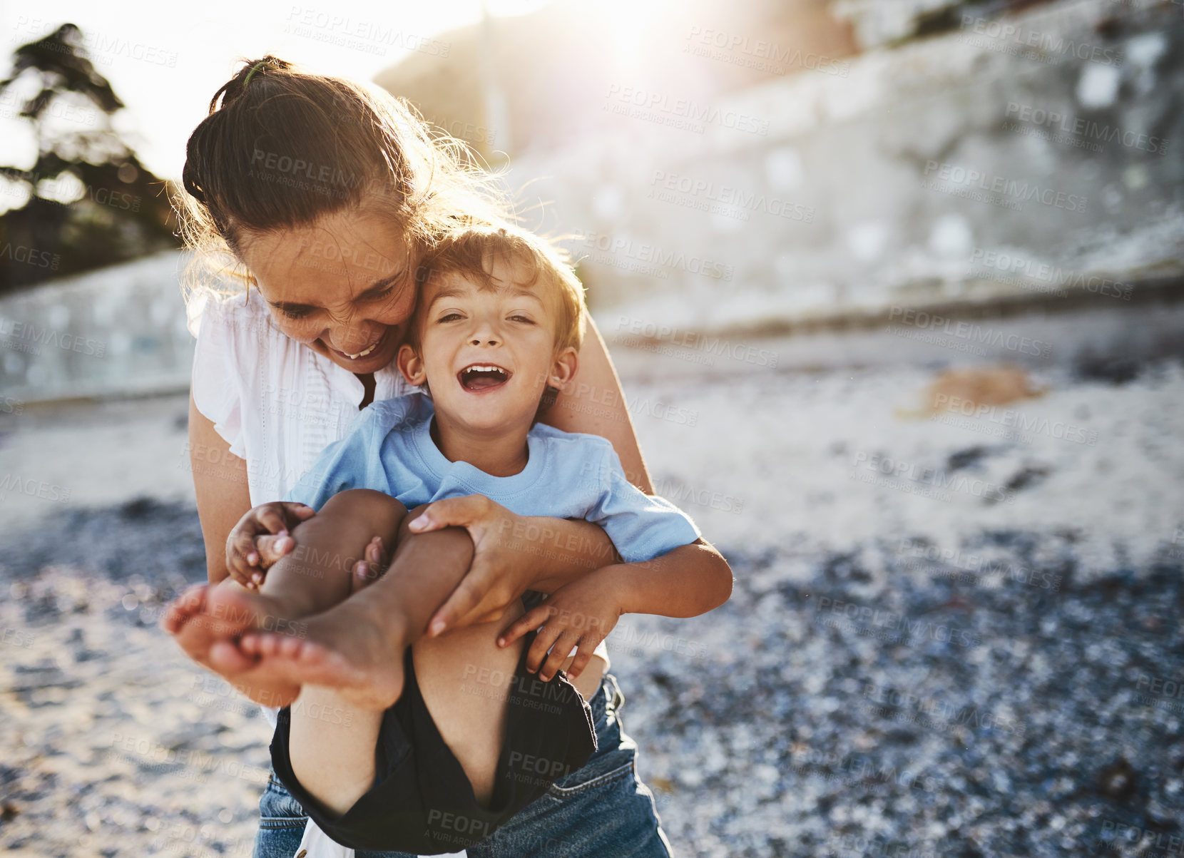 Buy stock photo Mom, child and beach fun with laughing, playing and happy by the sea with love, care and bonding. Vacation, holiday and travel outdoor with parent and boy by the ocean with smile and trip together