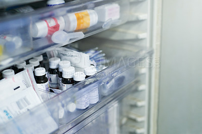 Buy stock photo Shot of shelves stocked with medication in a hospital