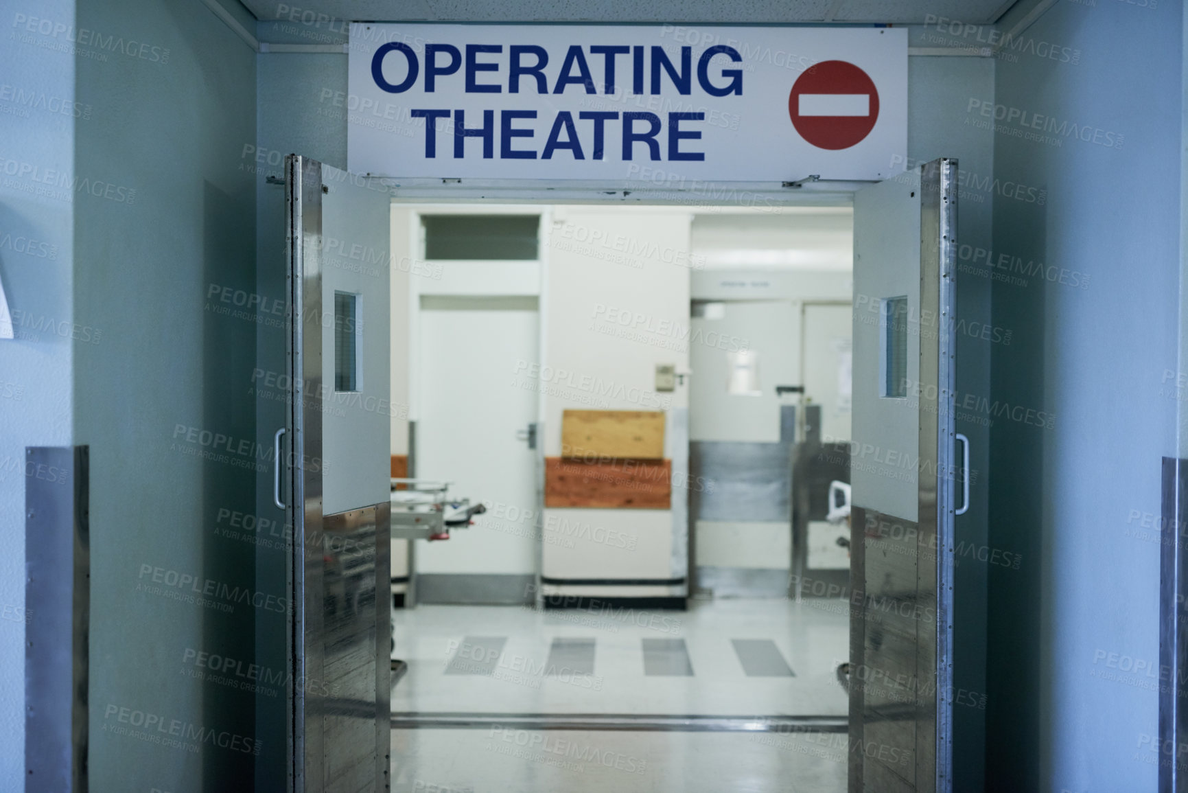 Buy stock photo Shot of open doors leading to an operating room in a hospital