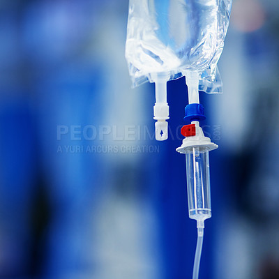Buy stock photo Closeup shot of medicine in an iv drip at a hospital
