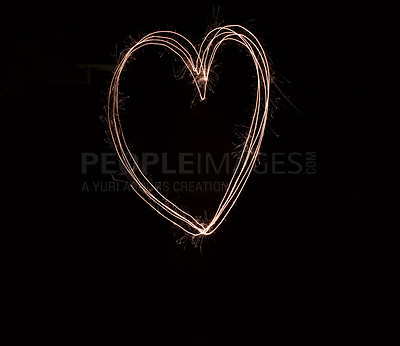 Buy stock photo Shot of a hart being drawn with a sparkler through use of light painting outside at night