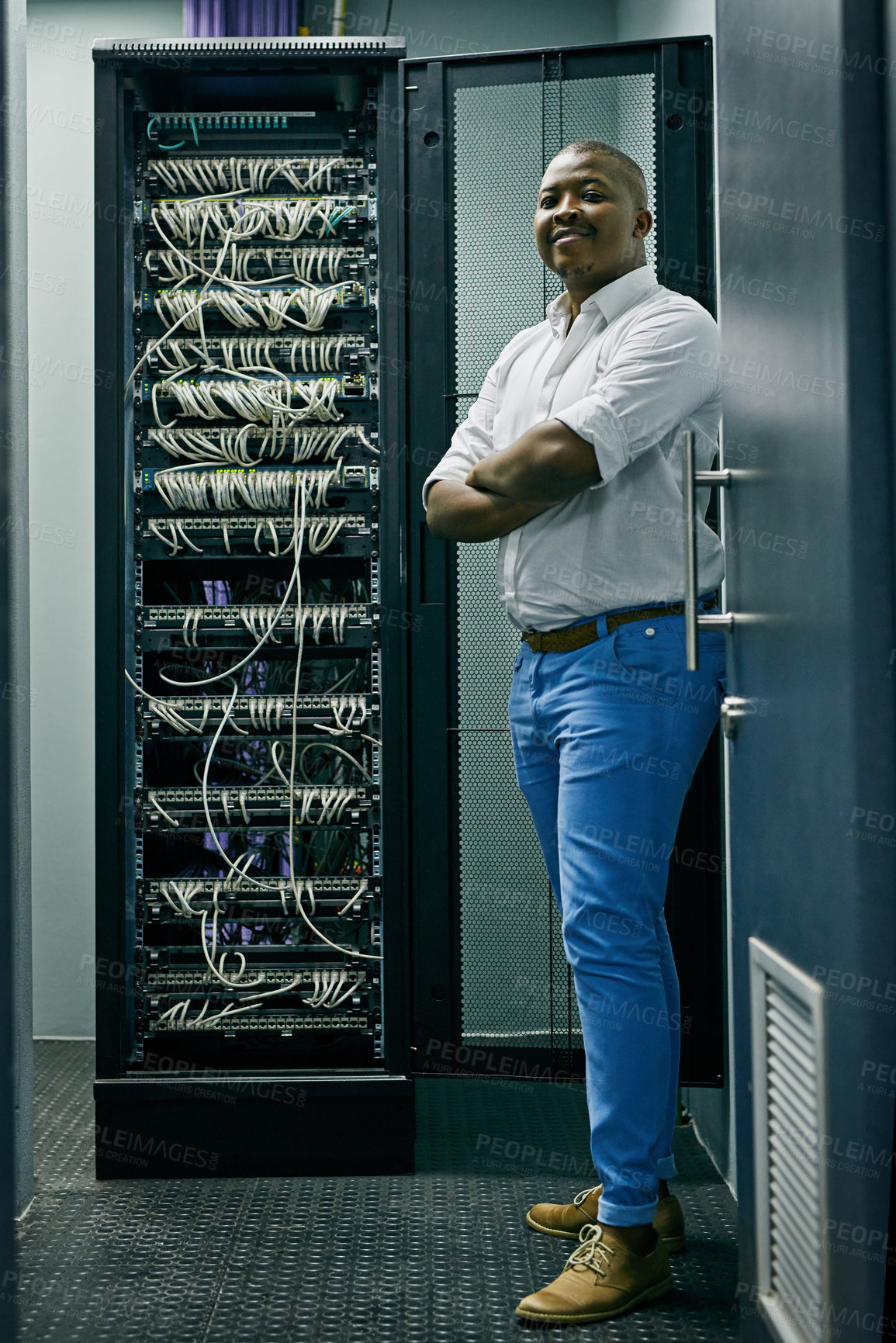 Buy stock photo Server room, confident black man or portrait of technician with cables for online cyber security or hardware cords. IT support, happy or proud African engineer fixing wires for information technology