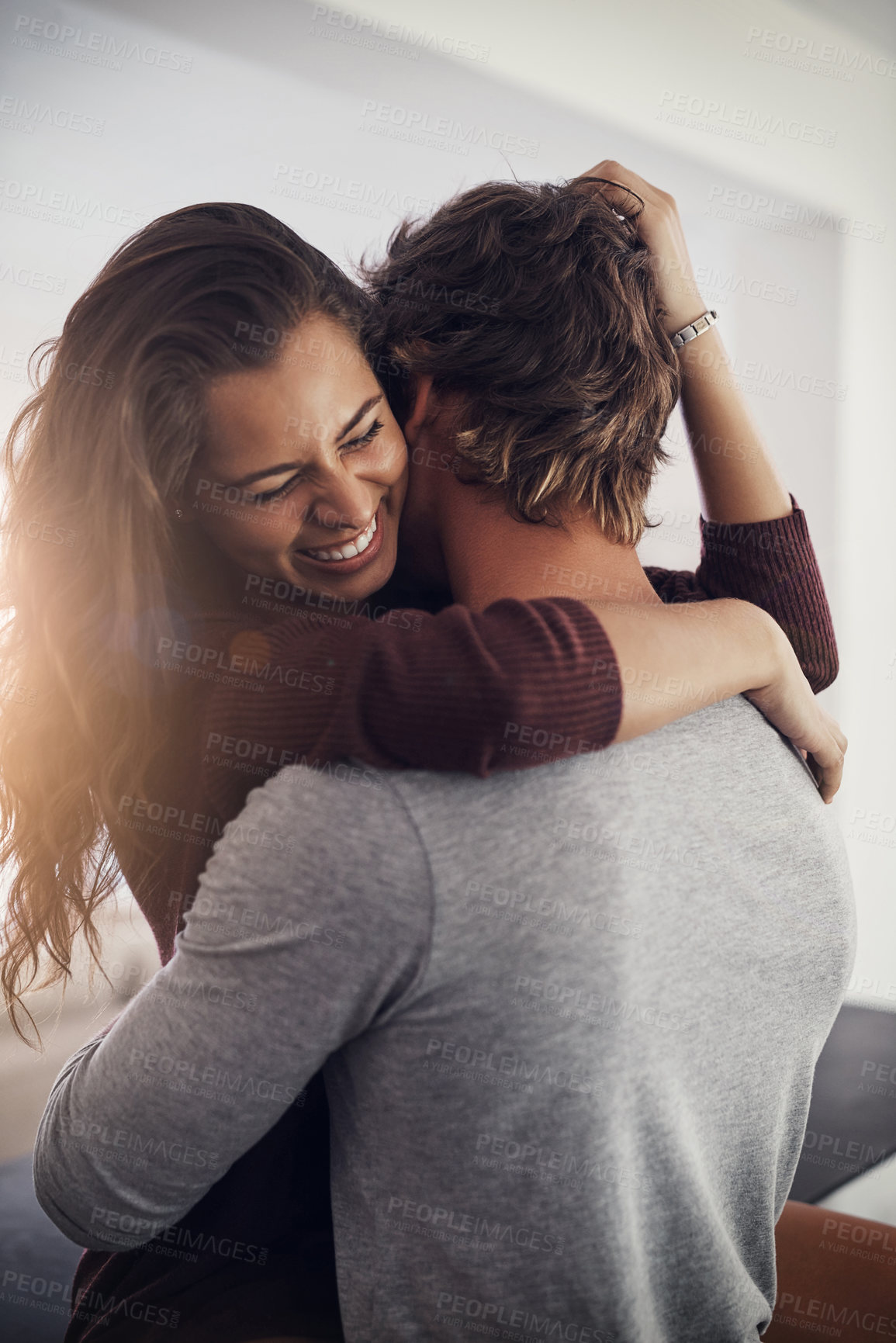 Buy stock photo Love, passion and a couple laughing in the kitchen of their home together in the morning for romance. Funny, intimate or sexy with a man and woman in their house for romantic intimacy or bonding