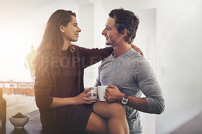Buy stock photo Cropped shot of an affectionate young couple at home