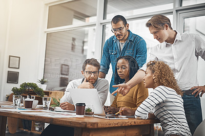 Buy stock photo Shot of a group of businesspeople having a meeting in an office