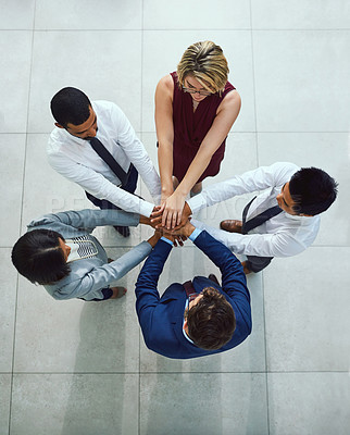 Buy stock photo Business diversity, hands pile and collaboration together from above in office. Corporate team, support and trust for hope, motivation and success working with commitment and union or teambuilding