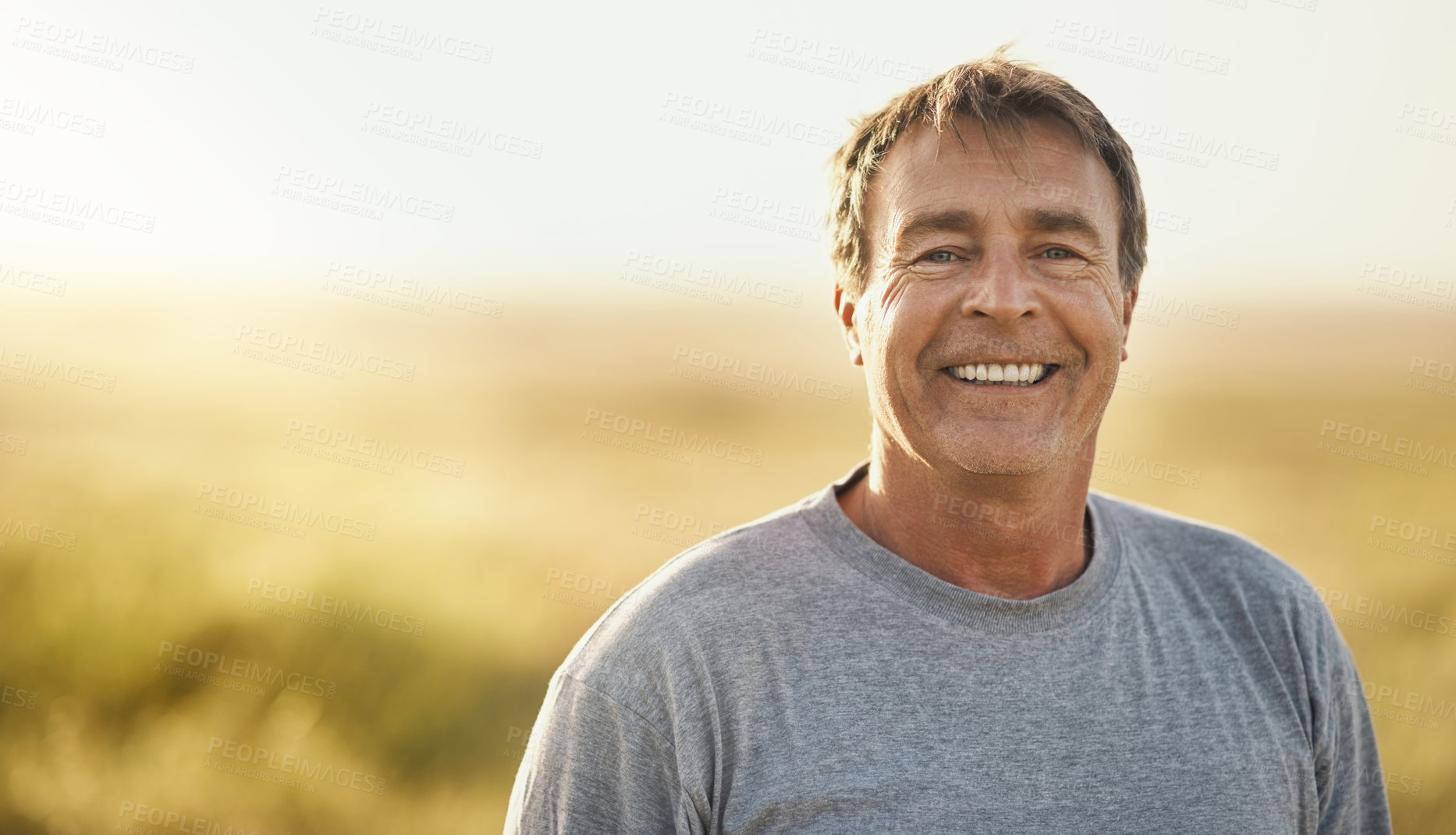 Buy stock photo Shot of a mature man standing outside