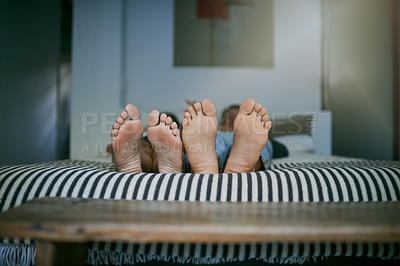 Buy stock photo Couple, closeup and feet in bed for sleeping, relax and peace at night together in home. Barefoot, toes and people lying in bedroom for comfort, dream and calm to rest on orthopedic mattress for nap