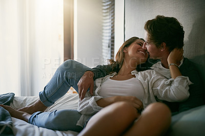 Buy stock photo Cropped shot of a loving young couple spending the day together at home