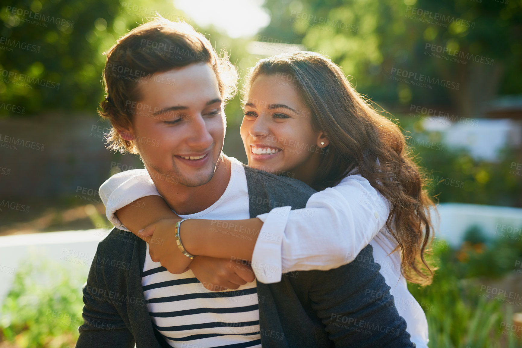 Buy stock photo Couple, hug and happy in garden on break with fun, laughing  and bonding for love in Spain. People, relationship and outdoor with smile for nature at backyard for support, care and trust at home