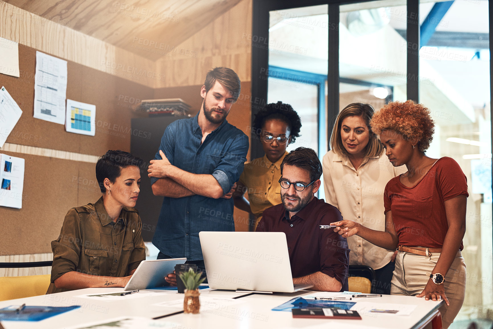 Buy stock photo Business, mentor and meeting with group on laptop for induction training, onboarding or company orientation. Intern diversity, manager or people with pointing for introduction questions or discussion