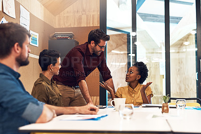 Buy stock photo Shot of a diverse group of businesspeople having a meeting in an office