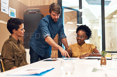 Buy stock photo Shot of a diverse group of businesspeople having a meeting in an office