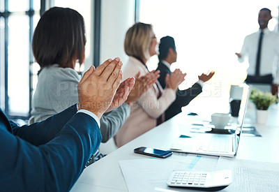 Buy stock photo Shot of businesspeople applauding during a presentation in an office
