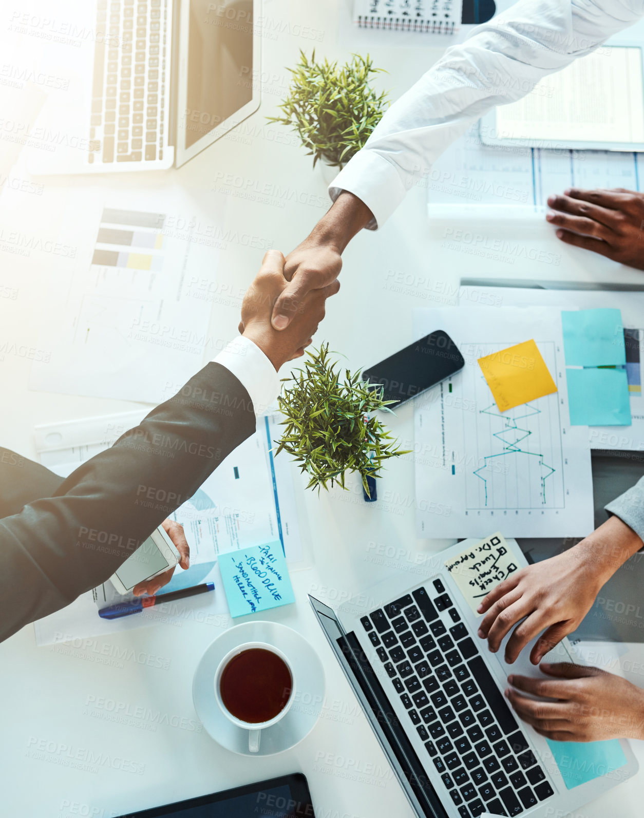 Buy stock photo Above, business people and meeting with handshake for partnership, onboarding and trust for b2b. Office, corporate investors and deal with shaking hands for agreement, negotiation and thank you