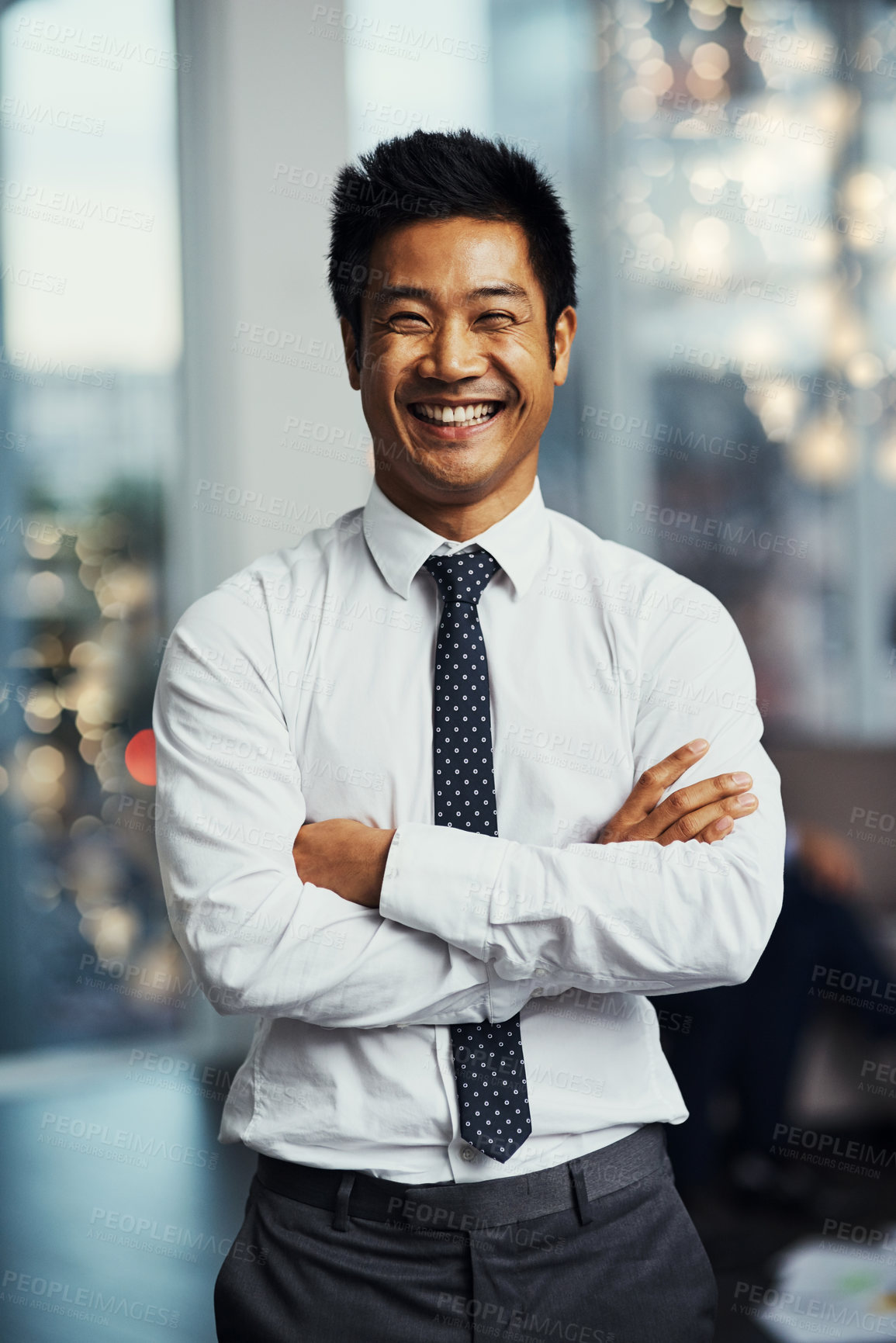 Buy stock photo Portrait of a well-dressed businessman standing in a office