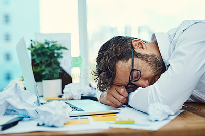 Buy stock photo Man, tired and sleeping on office desk with burnout, fatigue and overworked business employee with glasses, documents and laptop. Businessman, lawyer and exhausted sleep in company workplace