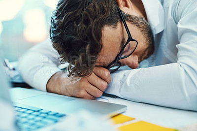 Buy stock photo Sleeping, man and tired in office with burnout, fatigue and overworked business employee on desk with glasses, paper and laptop. Businessman, lawyer and exhausted sleep in company workplace