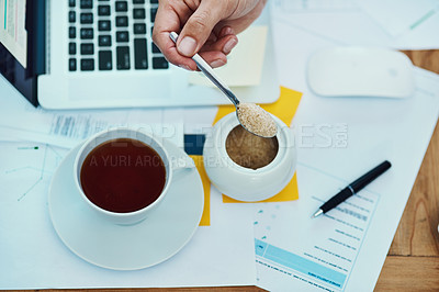 Buy stock photo Above, sugar and hand of person with coffee in office, dairy free and hot drink in business. Finance employee, black tea or sweetener at desk for refreshment, caffeine addiction or morning on new day