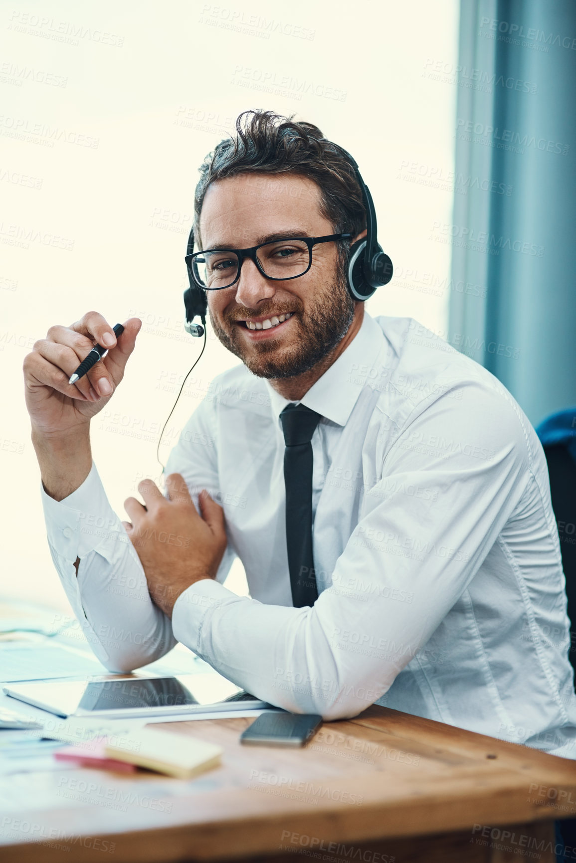 Buy stock photo Businessman, portrait and call center workplace with headset, help desk and friendly customer service for online advice. Tech support, telesales and communication, agent and consultation professional