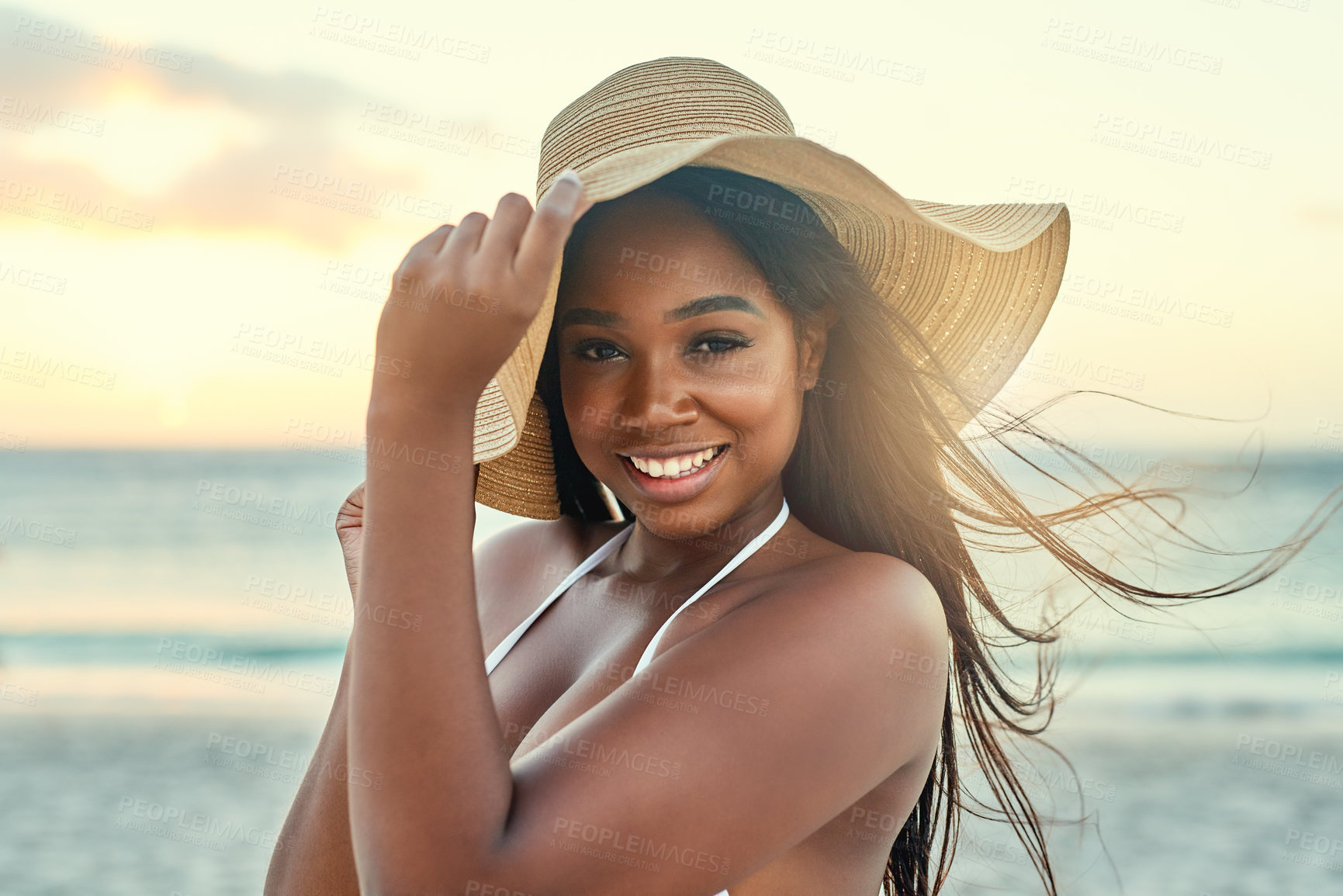 Buy stock photo Shot of a beautiful young woman in a bikini on the beach