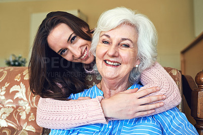 Buy stock photo Cropped shot of a senior woman and her granddaughter at home