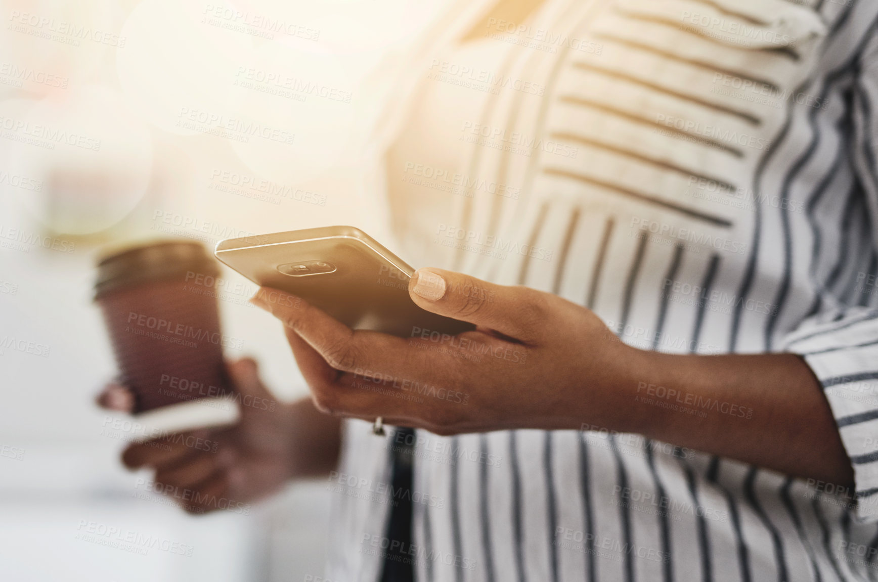 Buy stock photo Cropped shot of a woman using her cellphone