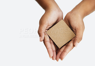 Buy stock photo Cropped shot of an unrecognizable woman holding a blank card