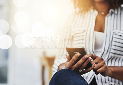 Buy stock photo Closeup of woman hands holding, typing and using a phone to browse the internet. Young casual female on smartphone texting, messaging and chatting with friends on social networks.