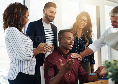 Buy stock photo Shot of a group of designers working together