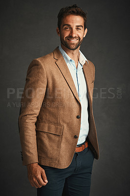 Buy stock photo Man, confident and fashion for portrait in studio with stylish, trendy and smart professional clothes as Professor. Smile, male person and designer outfit, elegant and pride on grey background