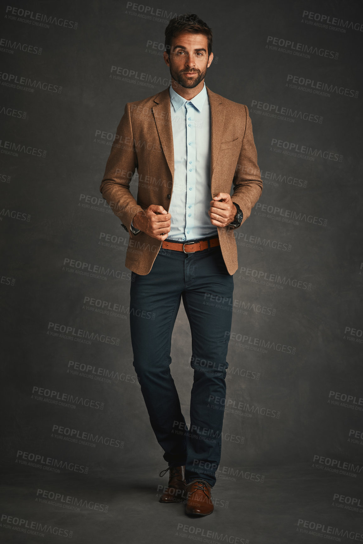 Buy stock photo Education, portrait and walking with professor man in studio on dark background for college lecture. Blazer, fashion and lesson with confident university teacher at school for development or learning