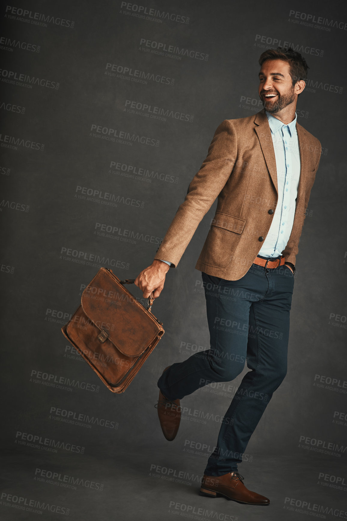 Buy stock photo Fashion, running and business man in studio with trendy style, accessory and formal clothes. Professional, happy entrepreneur and person with bag with confidence, pride and hurry on gray background