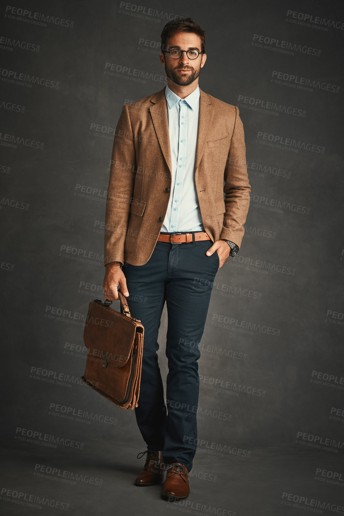 Buy stock photo Briefcase, education and portrait of professor man in studio on dark background for college lecture. Fashion, glasses and walking with serious university teacher at school for development or learning