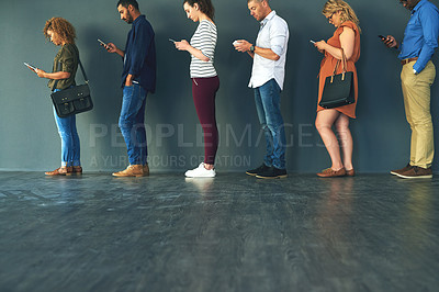 Buy stock photo Creative people, diversity and smartphone recruitment waiting in queue, job line or paperless HR interview row. Vacancy, men and women in human resources, hiring or onboarding office on cellphone