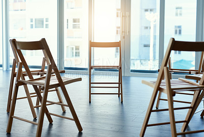 Buy stock photo Shot of chairs in an empty room with no people inside