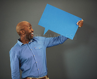 Buy stock photo Review, communication and speech bubble with business man marketing, holding and advertising his message on a blank board. Poster, billboard and mock up with empty message board with copy space.