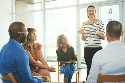 Buy stock photo Shot of a group of diverse creative employees having a meeting inside