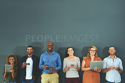 Buy stock photo Many diverse business people working with technology devices, digital marketing, collaborating online on grey copy space. Group connecting to global networking, advertising social community and unity