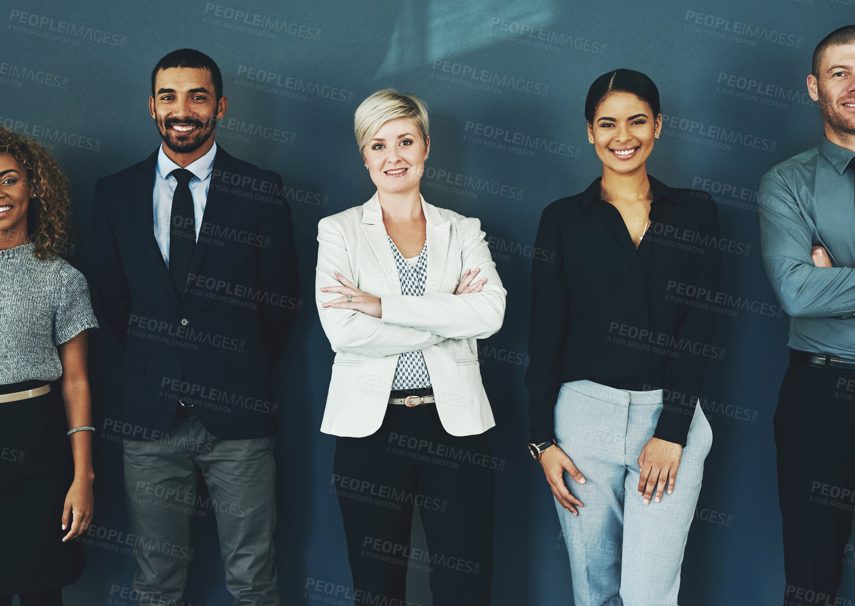 Buy stock photo Diversity, community and portrait of business people in studio for support, smile and teamwork. Happy, collaboration and professional with employees and wall background for motivation and mission