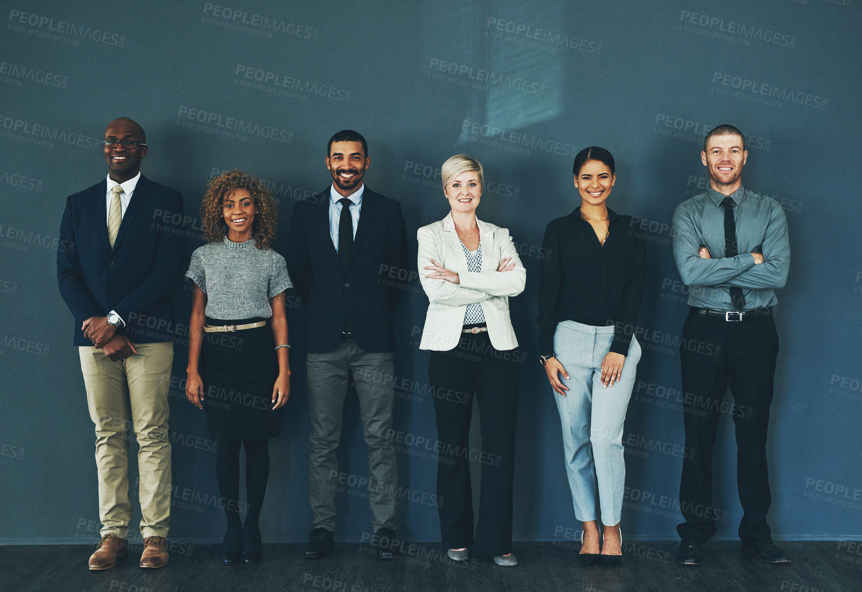 Buy stock photo Happy, smile and portrait of business people in studio for support, advisory and teamwork. Diversity, collaboration and professional lawyer with employees and wall background for legal mission