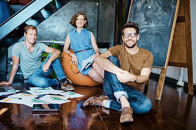 Buy stock photo Portrait of a group of young designers sitting in an office