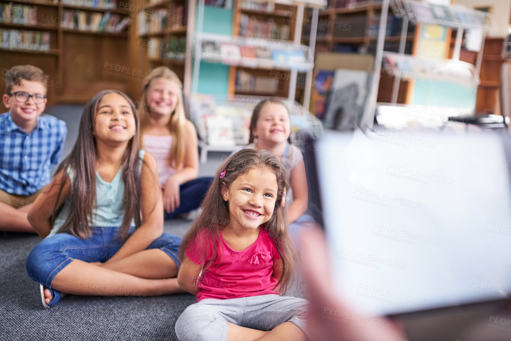 Buy stock photo Shot of a group of young children having a lesson at school