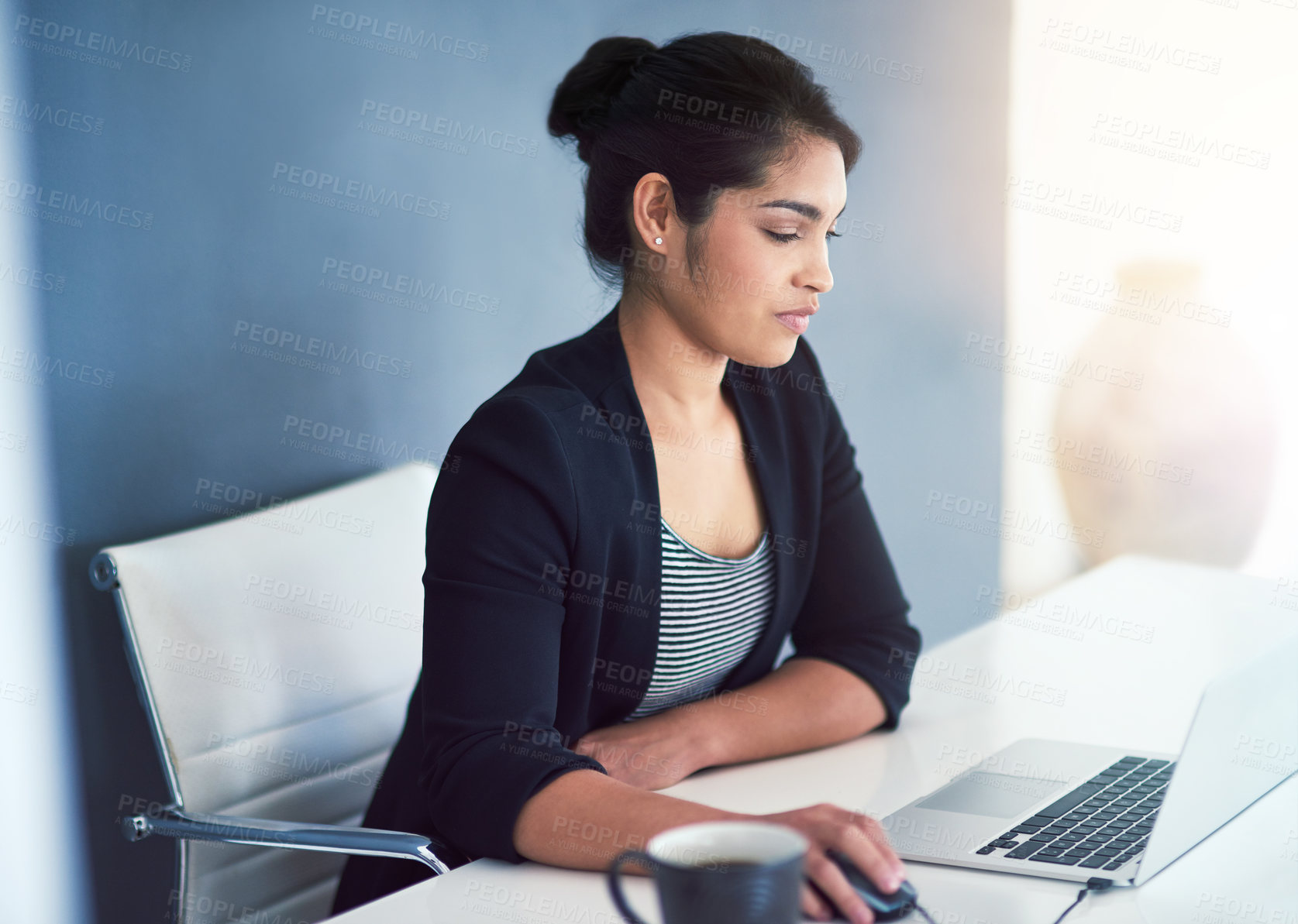 Buy stock photo Social networking, businesswoman with laptop and at her desk in a modern workplace office with a lens flare. Online communication or technology, connectivity and female person at her workspace