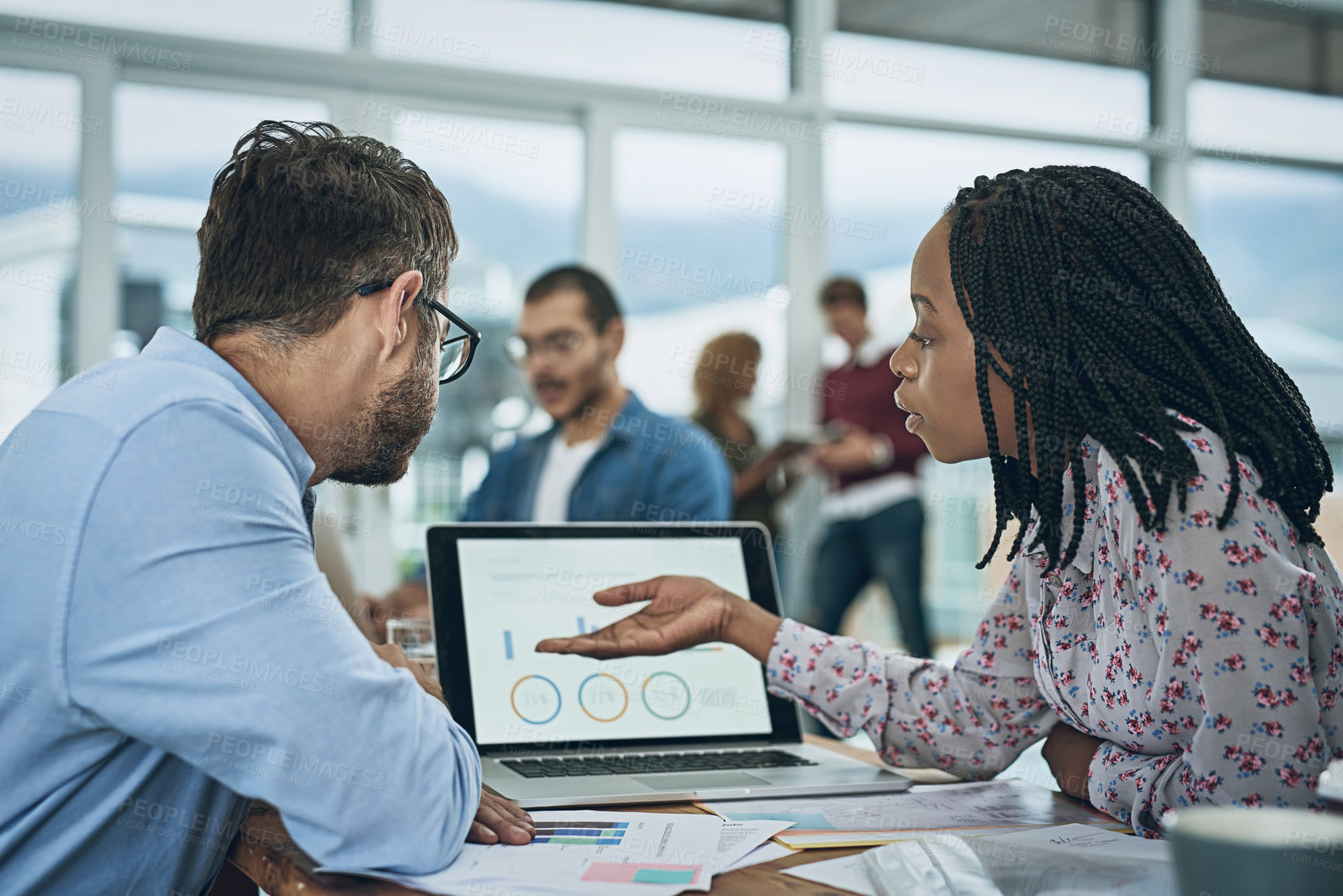 Buy stock photo Laptop, finance and chart with a business team doing research together in their office for planning. Computer, data or graph with a man employee and woman colleague meeting to discuss strategy