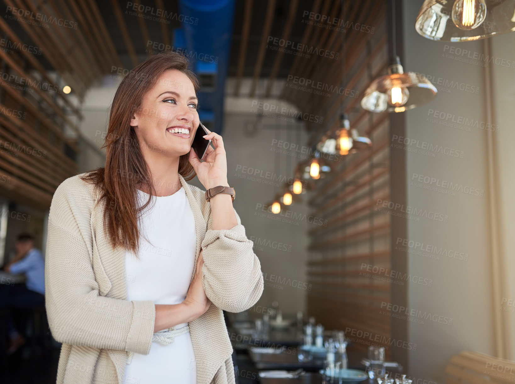 Buy stock photo Smile, phone call and woman restaurant owner with positive feedback from customers for business. Happy, communication and female cafe manager with hospitality review on mobile conversation for career