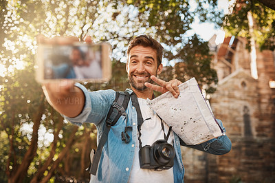 Buy stock photo Tourist, happy man and peace sign selfie outdoor in a city for travel holiday with memory, smile and happiness. Male person with hand emoji for adventure, journey or vacation photo and freedom