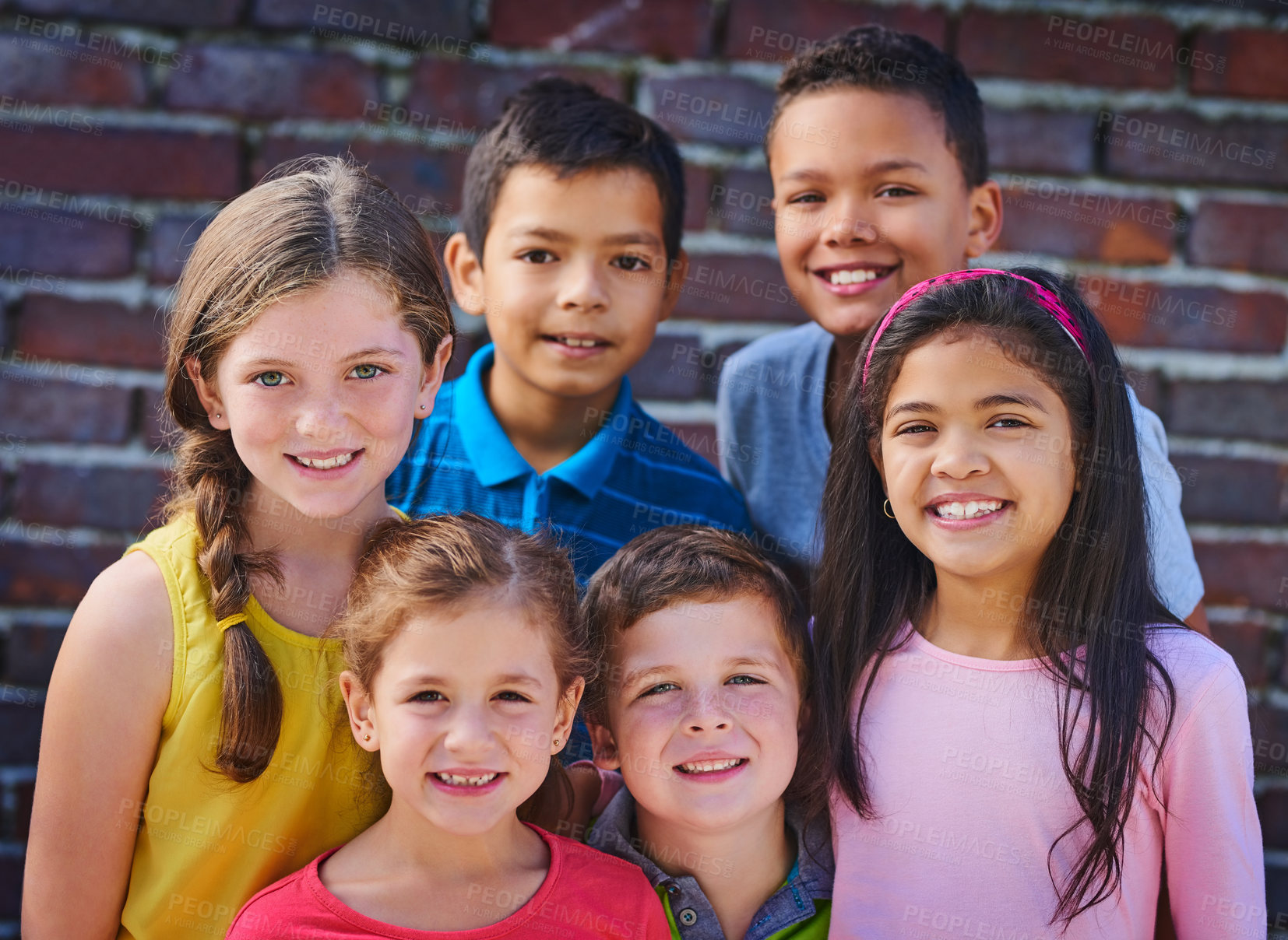 Buy stock photo Portrait of a diverse group of children outside